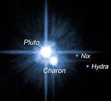 Спутники Плутона. Изображение получено телескопом Хаббл.