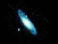Большая спиральная галактика, видимая невооруженным глазом как туманное пятно в созвездии Андромеды.